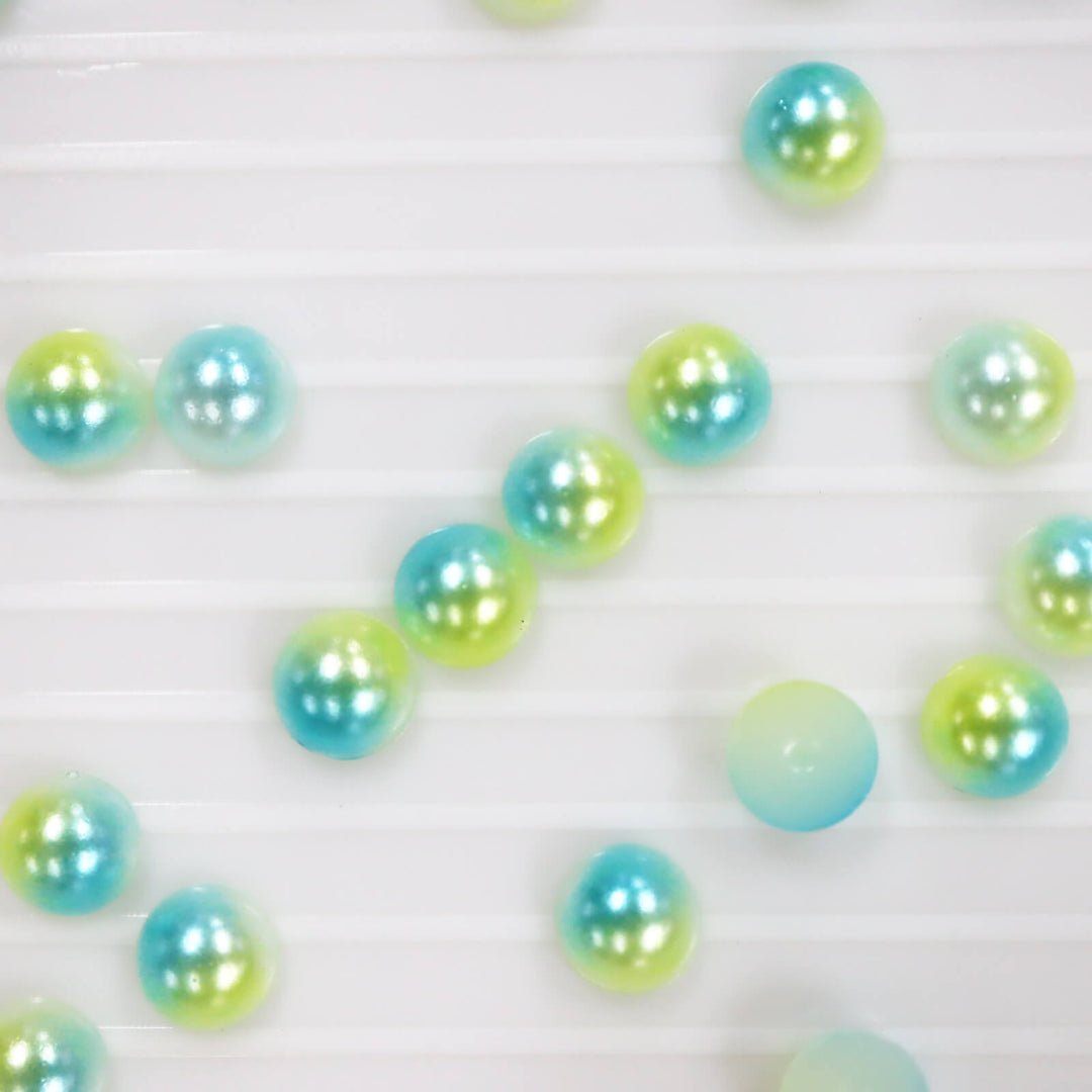 Iridescent turquoise-yellow ABS half pearl - Worthofbest